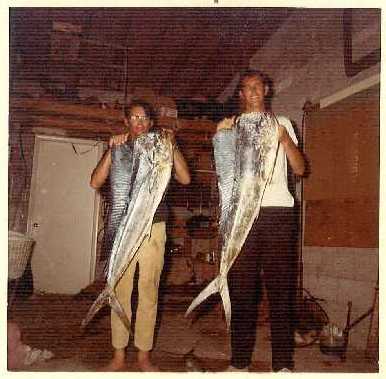 Holding a mahi-mahi offshore, decades back